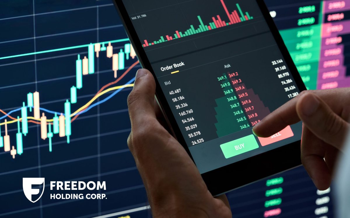 Successful of trader use phone trading stock exchange graph money, global economic, trader investor,graph money of block chain stock market cryptocurrency selling and buy with price chart data graph